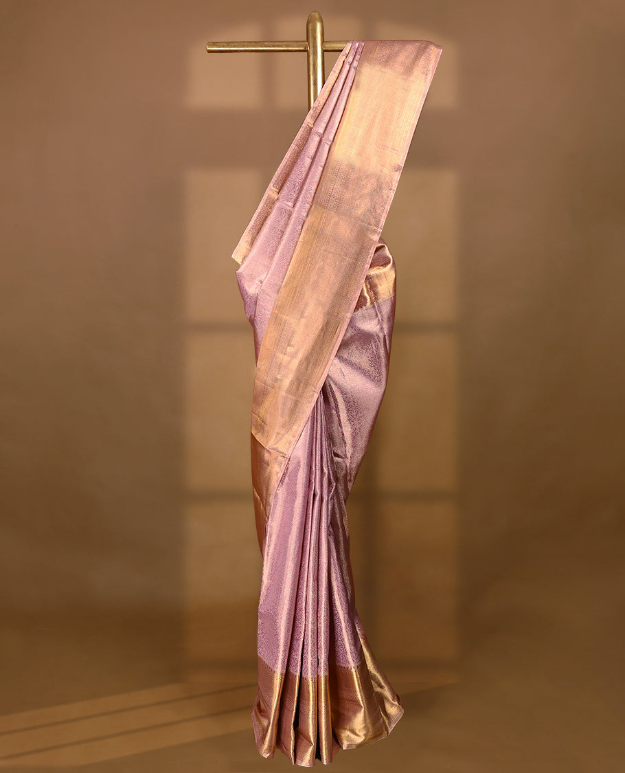 Light Onion Colour Tissue Silk Saree having Floral Designed Body with Contrast Border and Self Coloured Blouse