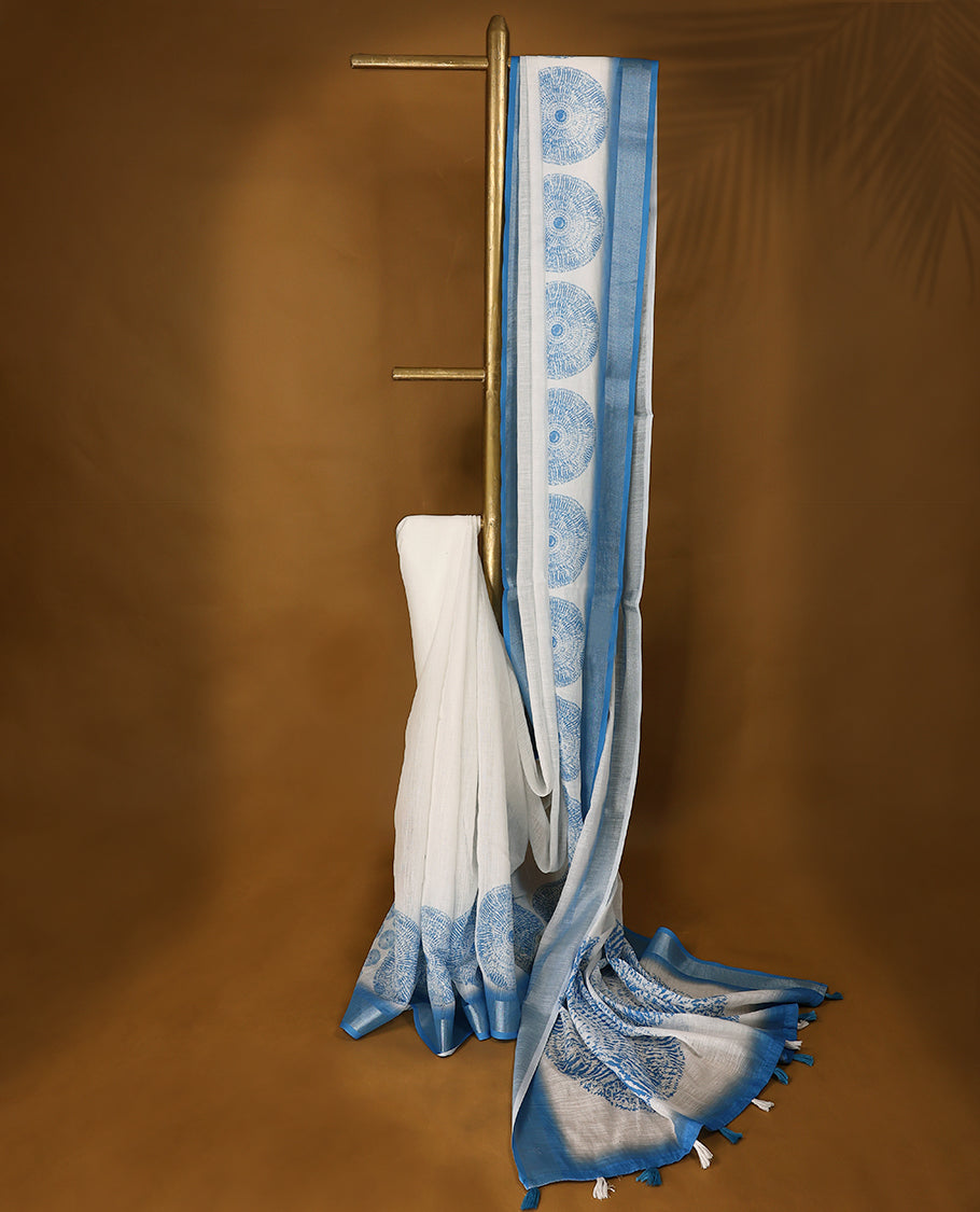 Blue and white cotton saree featuring a nature-inspired abstract print and a Blue border with Matching Blouse