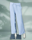 Light blue colour women's pants with a relaxed fit, breathable textured fabric, and an elastic waistband with drawstring
