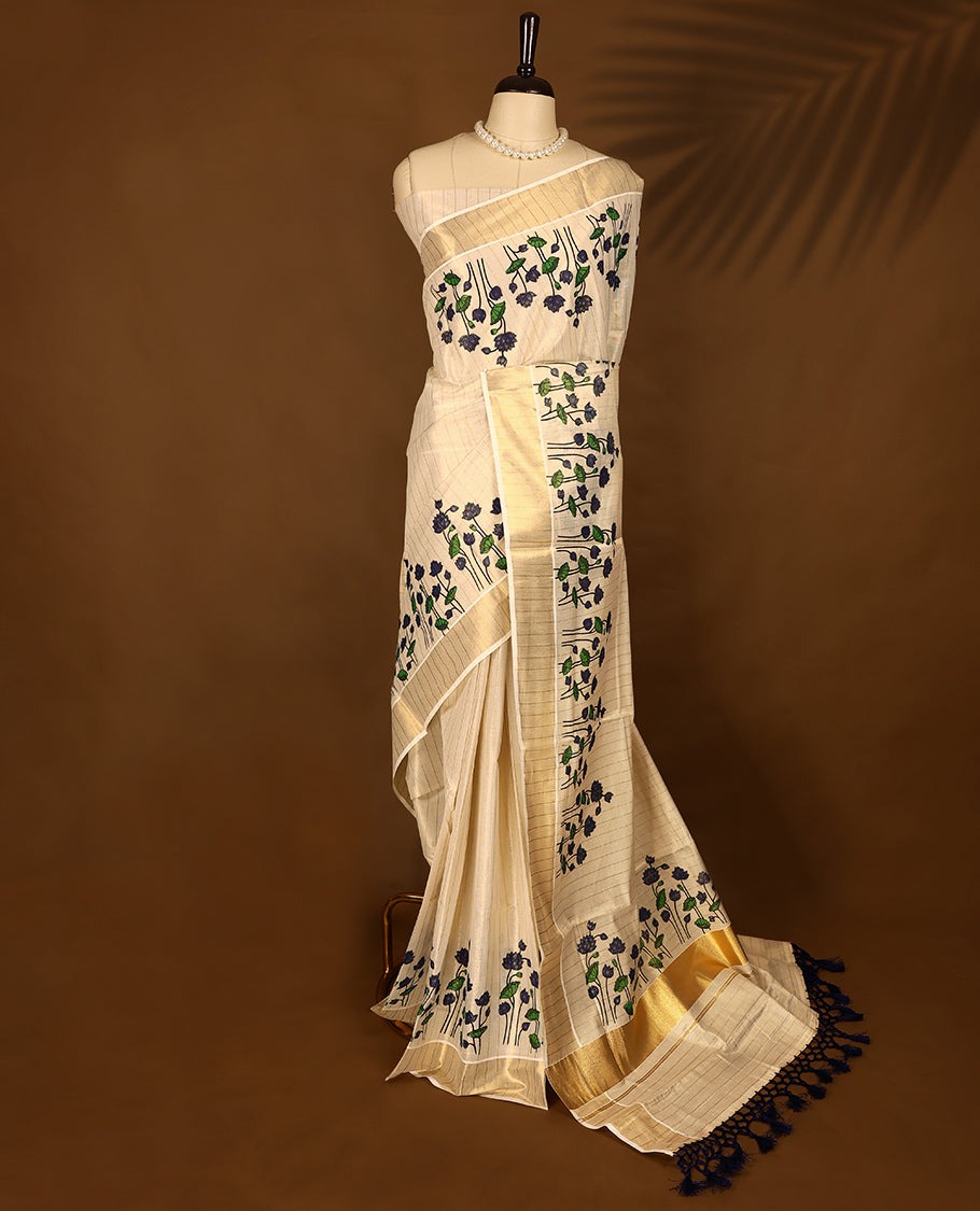 Light Golden Elegant Kerala Tissue saree with striped Body, paired with Kasavu border having Lotus Prints & a matching blouse