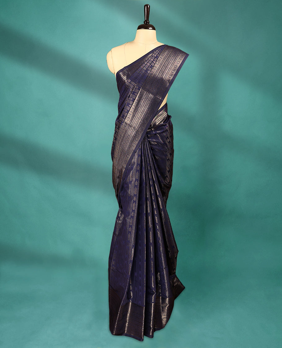 Navy Blue Art Soft Silk Saree showcases intricate silver zari work on the body and border, paired with a matching blouse