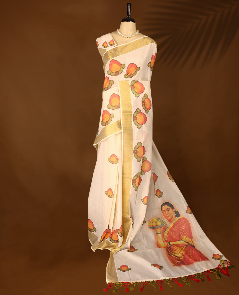 Kerala cotton saree with fine Prints and a Golden lustrous zari border with Matching Blouse