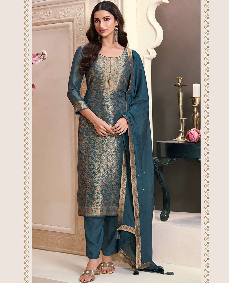 Greyish Blue Colour hand-worked shimmer jacquard top, paired with a santoon bottom and a silk georgette dupatta.