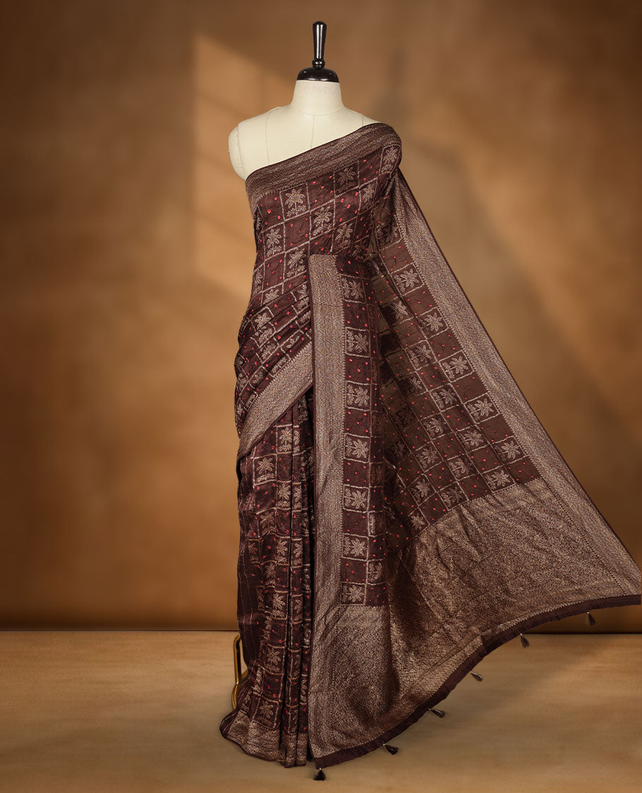 Dark Brown colour Banarasi Bandhani silk saree featuring with intricate Banarasi motifs on body, complemented by antique zari woven border and grand pallu, paired with matching blouse