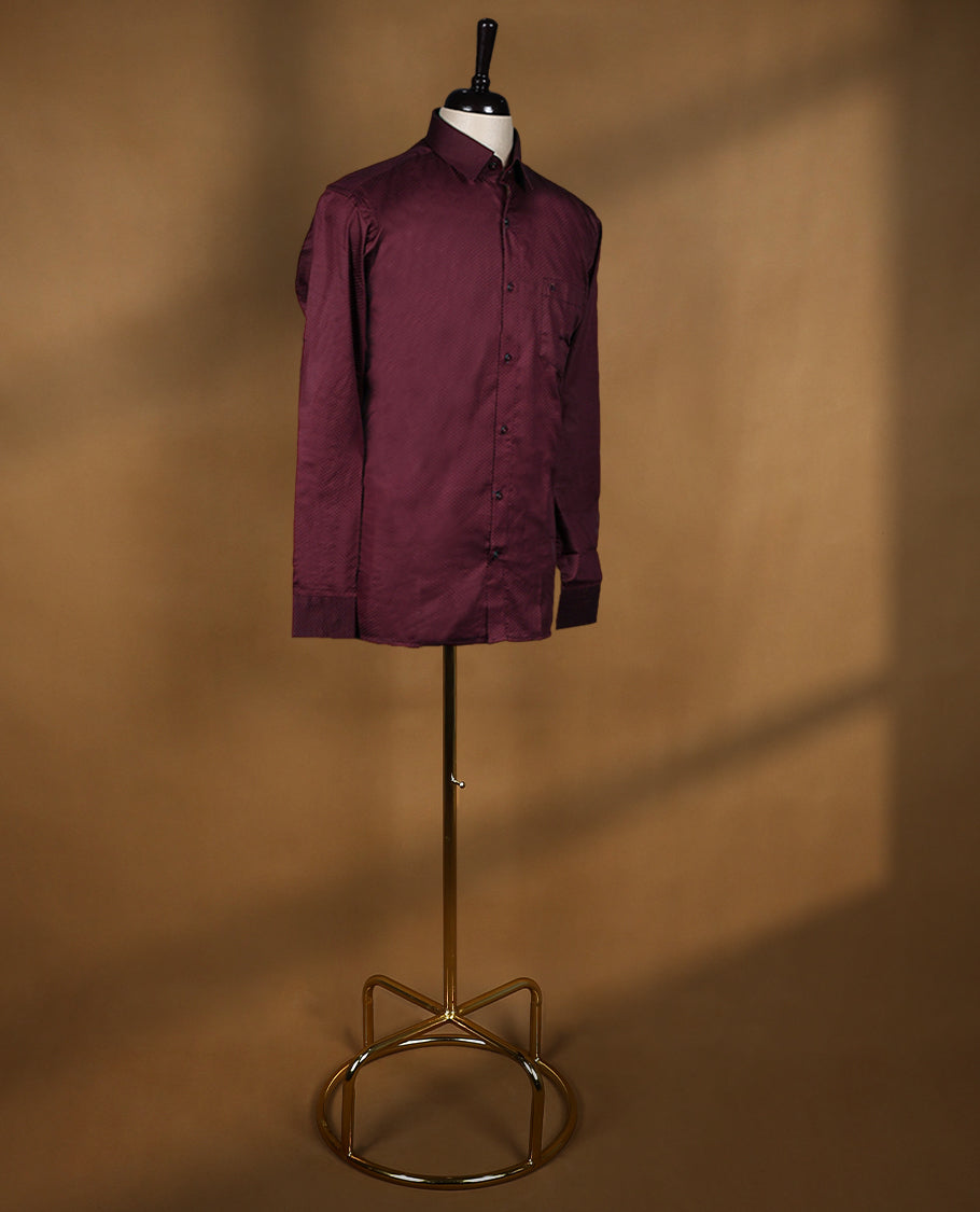 Maroon colour OTTO men’s shirt in a relaxed formal fit, featuring a subtle dotted self design texture, full sleeves, classic collar, and chest pocket ideal for both office and evening wear.