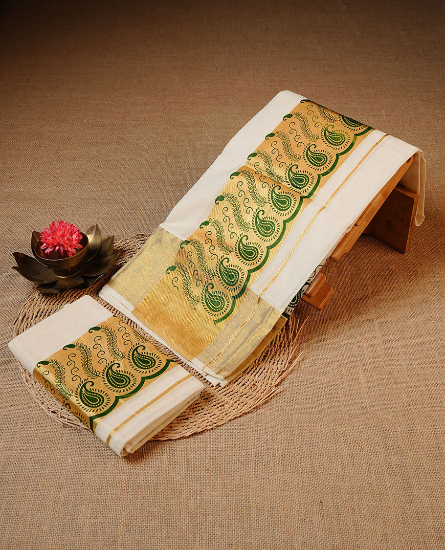 off white colour cotton set mundu features a plain body accented by a golden kasavu border with green paisley motifs.