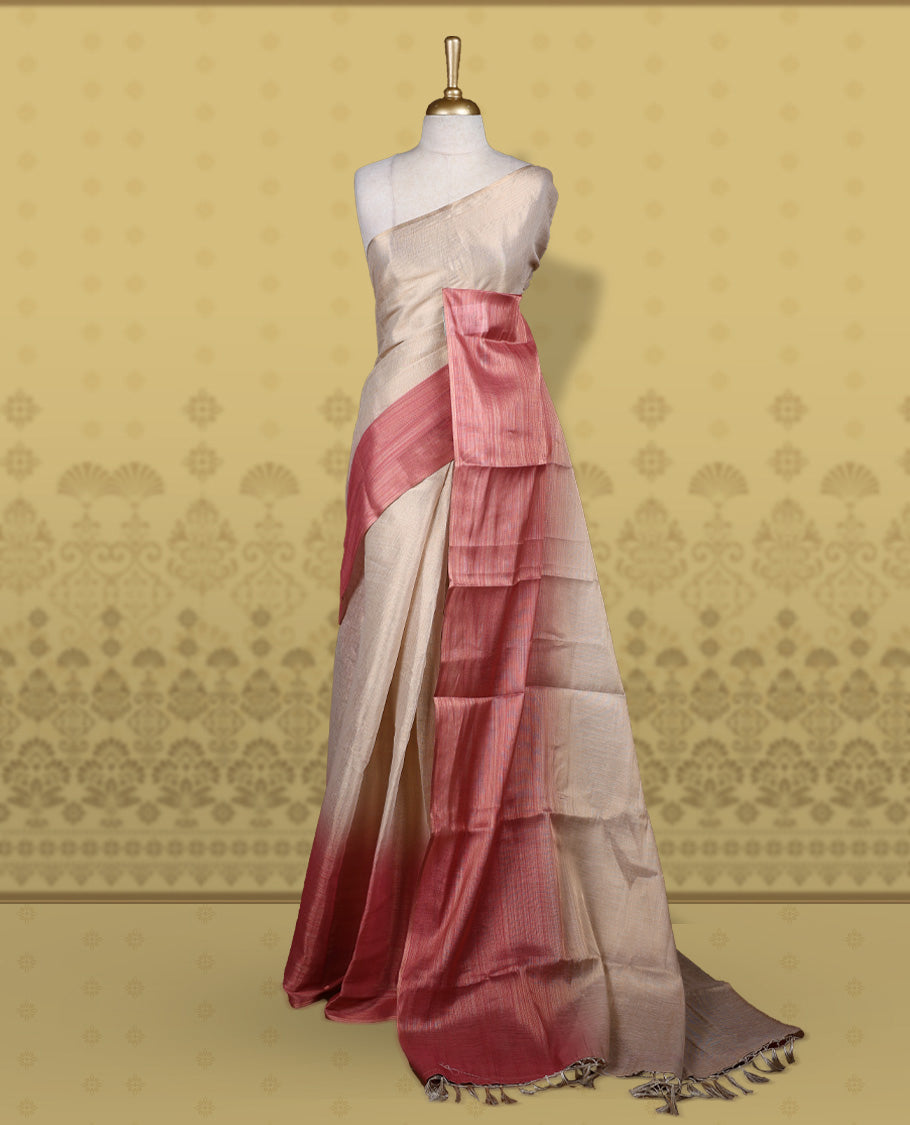 Beige and rose pink colour saree featuring a soft woven texture & The shaded pink pallu enhances its elegant drape & Finished with neat tassels and paired with a matching blouse piece.