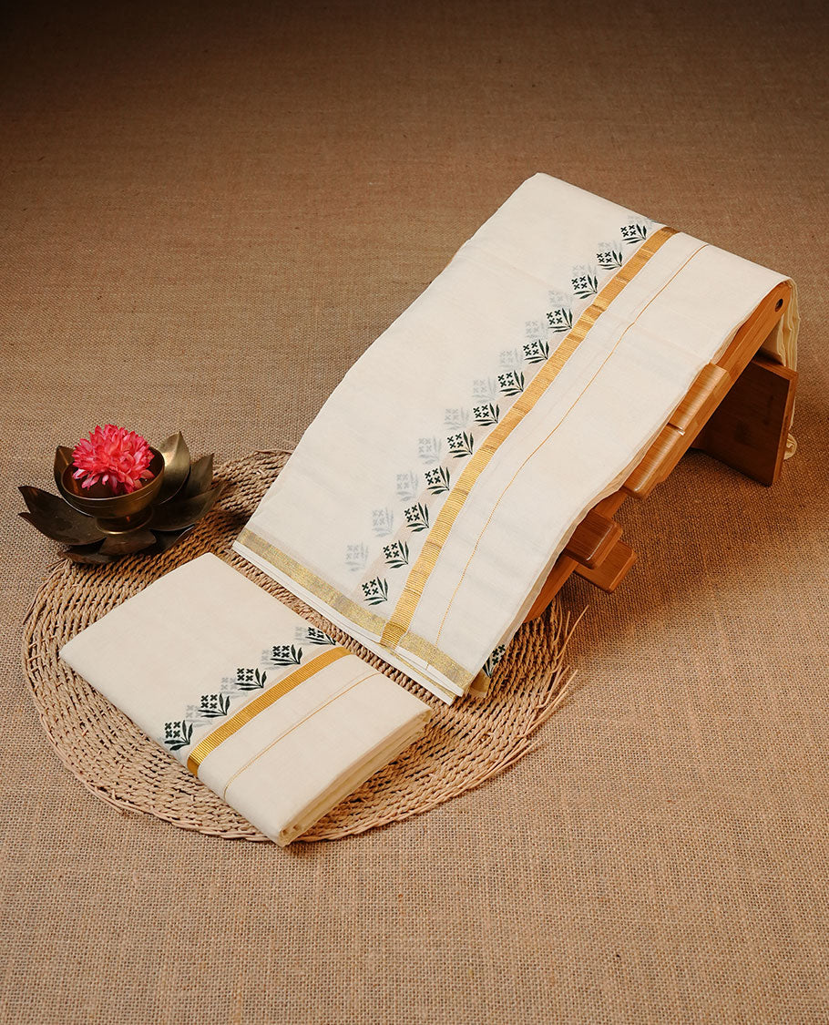 Off white colour Cotton Set Mund featuring a plain body, enhanced by a floral print on zari border.