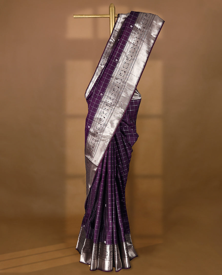 Royal Purple traditional Kancheepuram silk saree featuring antique zari check patterns with peacock and chakkram motifs on the body, a coordinated peacock and chakkram design on the border, and a matching Contrast blouse.