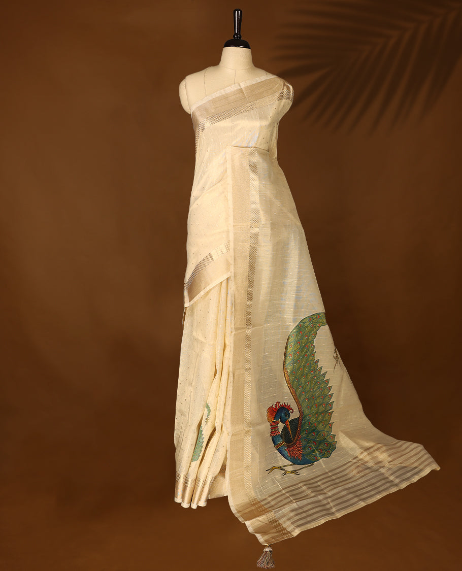 Light gold colour Organza Kerala saree featuring a sheer, smooth body, Gold Kasavu border, Peacock printed pallu, Comes paired with a coordinated matching blouse.