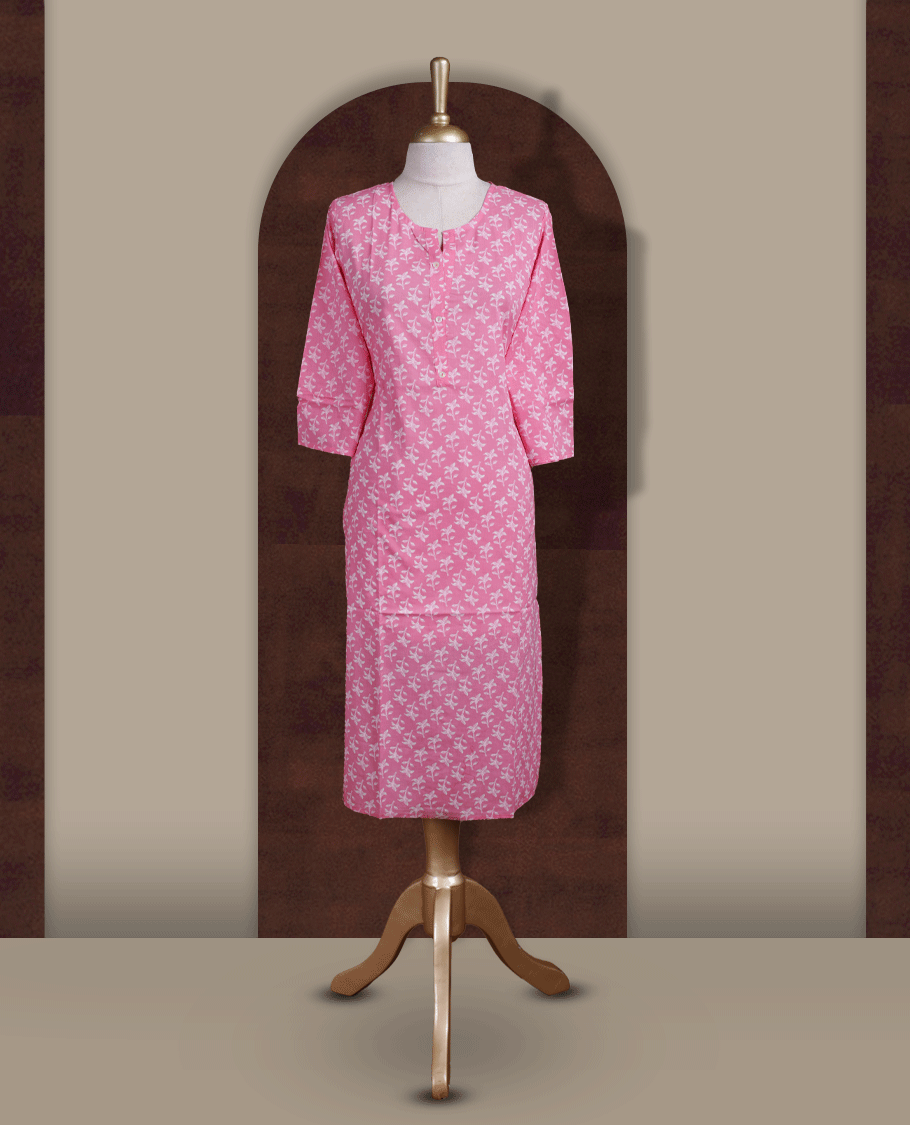 Soft pink colour kurthi with off white floral prints, crafted from soft cotton for a breezy and elegant look & styled with a round V notch neckline and comfortable 3/4th sleeves and a button down front.