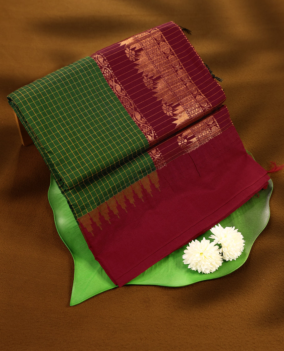 Grass Green colour mixed Kalyani cotton saree featuring mustard colour Checks throughout the body, paired with a Maroon colour traditional border and pallu, with matching blouse