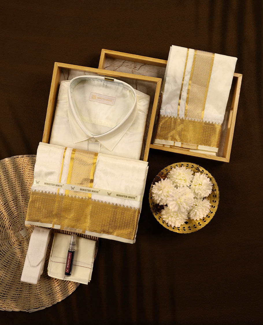 Cream gold coloured silk wedding shirt, dhoti, and towel set from MINISTER WHITE, featuring a gold zari border.