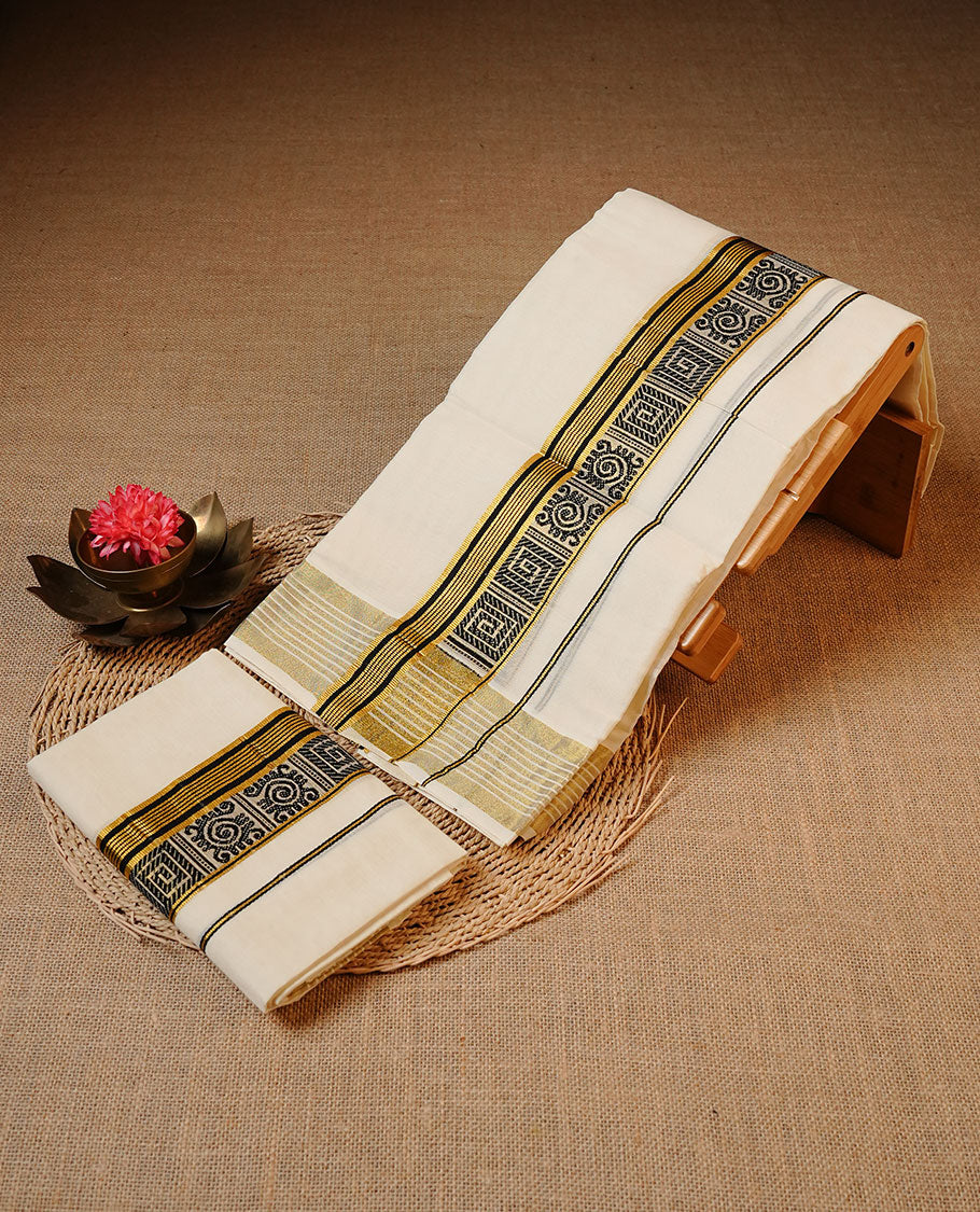 Off white colour Cotton Set Mund featuring a plain body, enhanced by a traditional black woven border with geometric motifs and gold zari stripes.