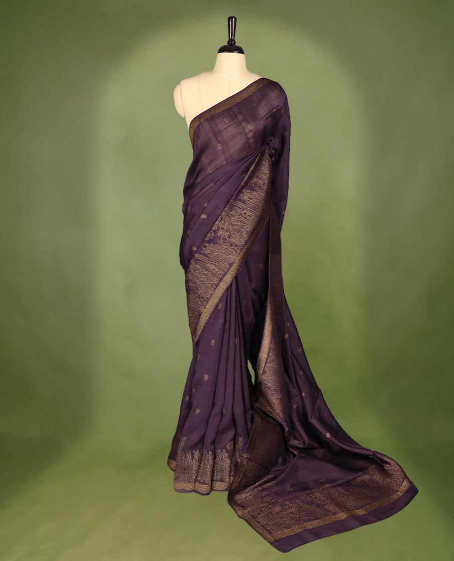 Black Currant semi-Banaras tussar georgette saree adorned with antique zari floral motifs on the body, beautifully highlighted with a pencil art garden-inspired border, paired with a matching blouse.
