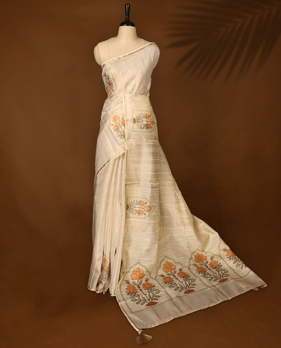 Ethereal offwhite colour organza Kerala saree with elegant orange floral embroidery and a subtle zari-style border, Lightweight and graceful, paired with a matching blouse, Perfect for festive and elegant occasions.