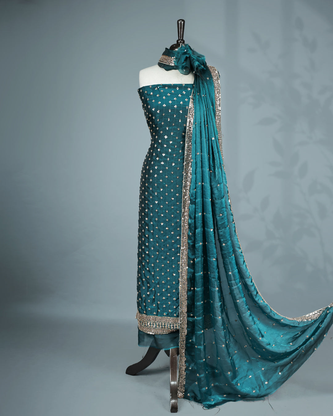 Teal colour salwar material with Cut beats & sequins work on body, Matching Bottom & dupatta.