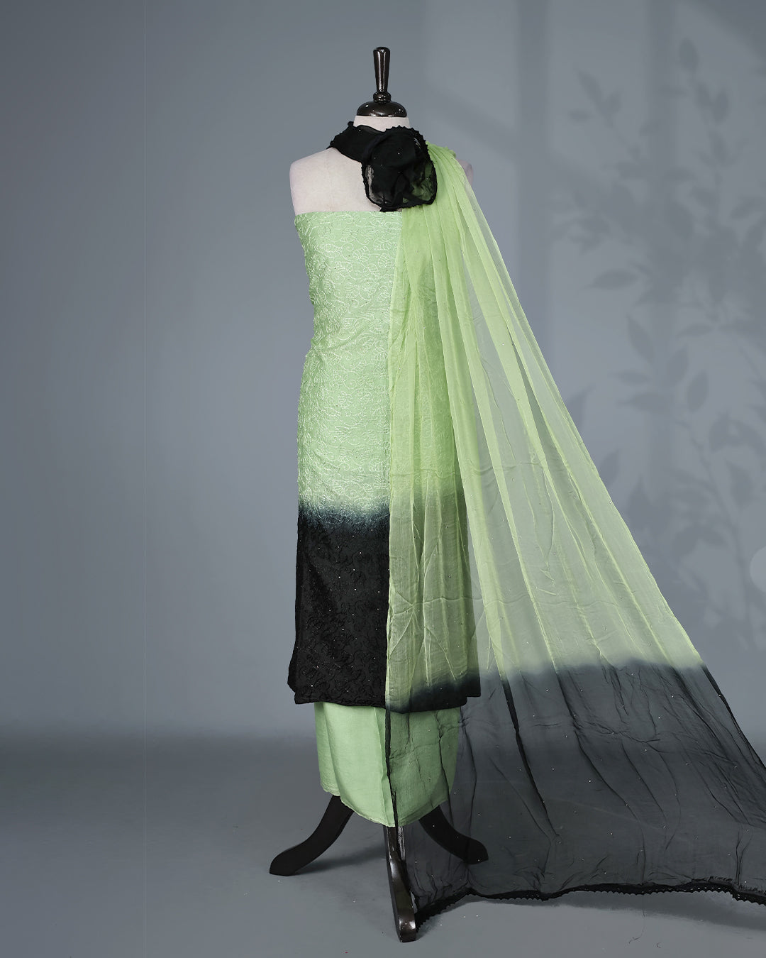 Pista Green & Black Ombre Colour Salwar Material Featuring Elegant Self Thread Embroidery on the Kurta, paired with a matching bottom & graceful shaded Dupatta.
