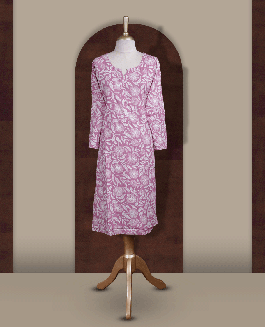 Mauve colour kurthi adorned with delicate white floral prints & styled with a round V notch neckline and comfortable 3/4th sleeves.