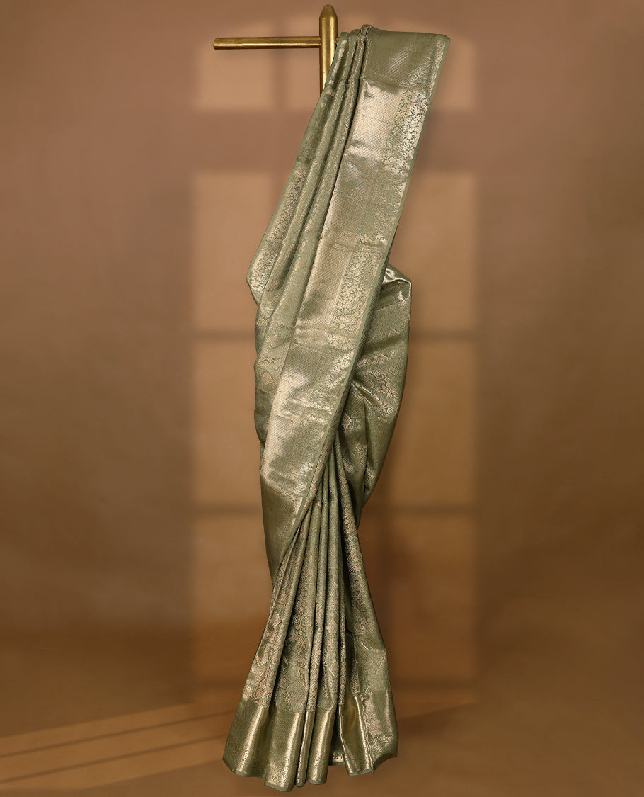 Pastel Sage Green Colour Kancheepuram Wedding Silk Saree having Zari Worked Body and Border with Self Coloured Blouse