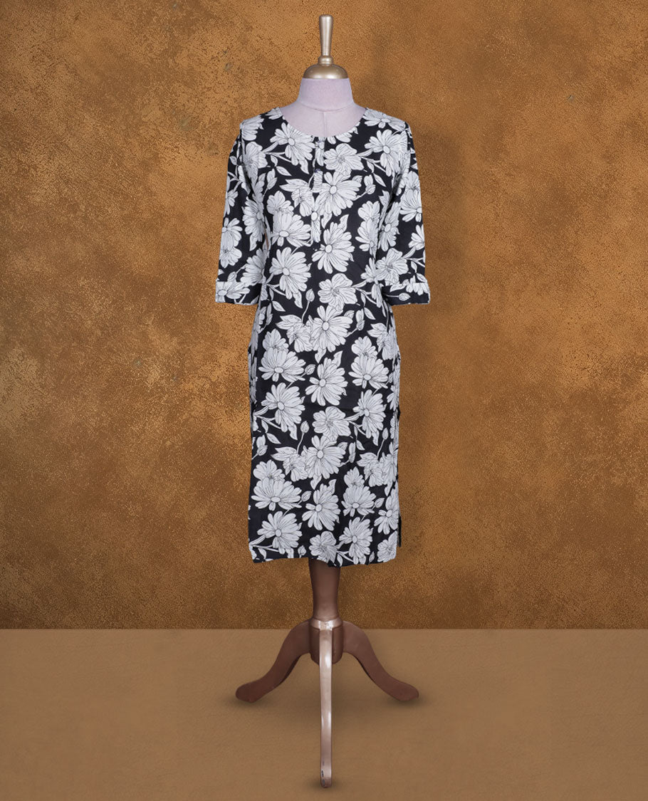 Black and white colour kurti with White floral prints, knee length design, styled with a round neckline and a sleeve .