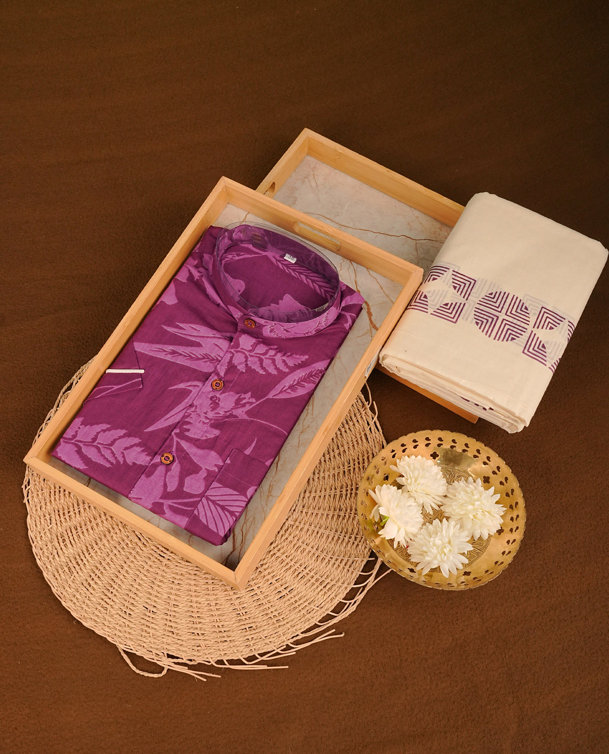 Purple colour shirt featuring a floral pattern printed body, paired with a cream colour double dhoti featuring a printed border.