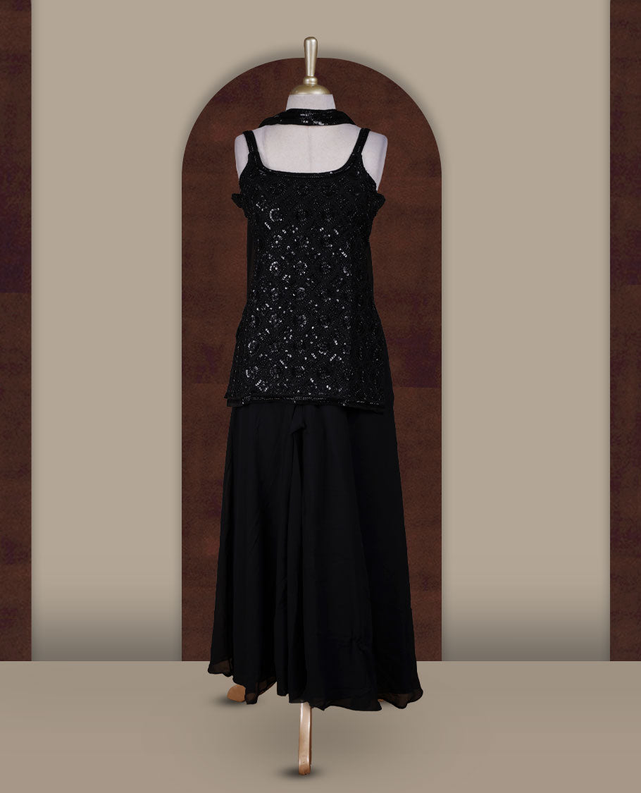 Vibrant Black colour sharara set featuring a sleeveless sequin embellished top with delicate beadwork, paired with a flowy flared bottom and dupatta for a contemporary festive look.