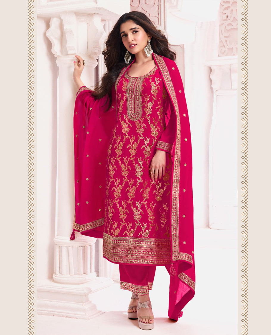 Rani Pink Chinon jacquard top, paired with an embroidered Santoon bottom and matching embroidered Chinon dupatta