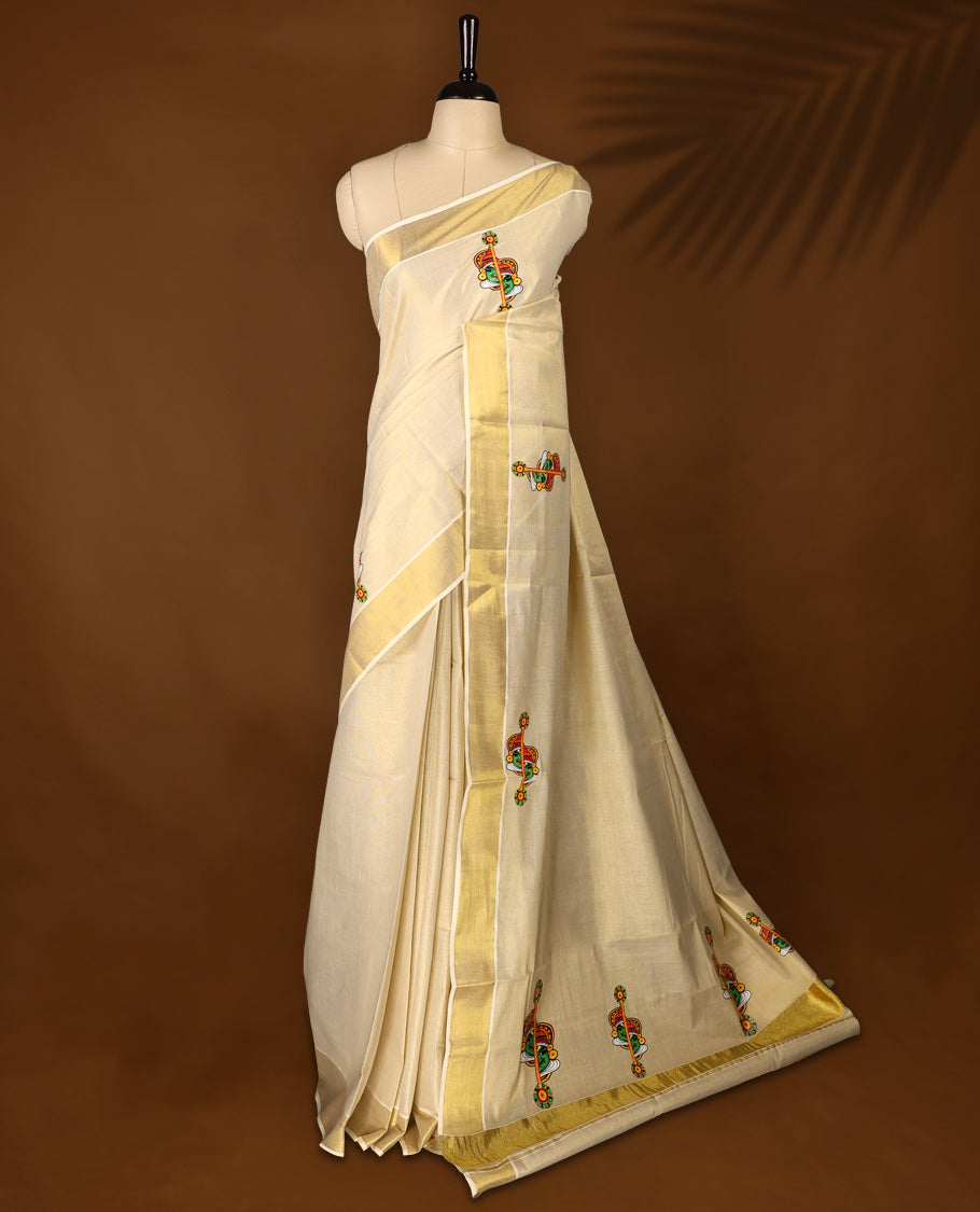 Light Gold colour Tissue Kerala saree featuring Kathakali prints on body and a beautifully woven Gold Kasavu border, paired with a matching blouse perfect for festive occasions.