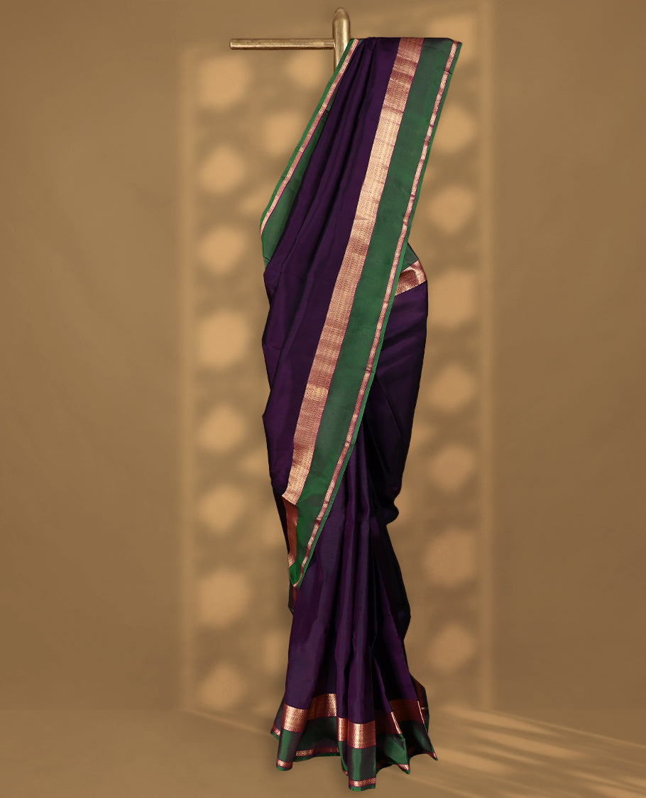 Dark Grape Colour Vasundhara Silk Saree having Plain Body with Green Colour Border and Light Grape Blouse