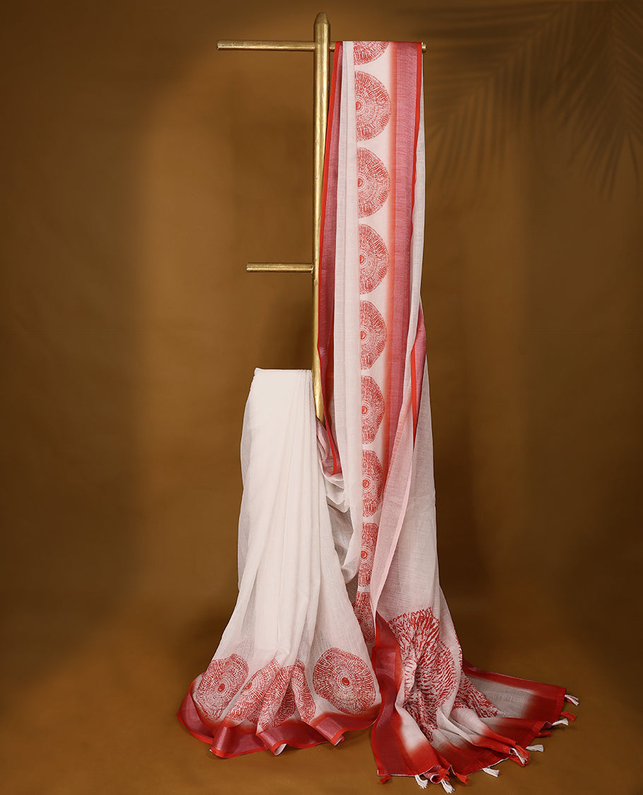 Red and white cotton saree featuring a nature-inspired abstract print and a Red border with Matching Blouse