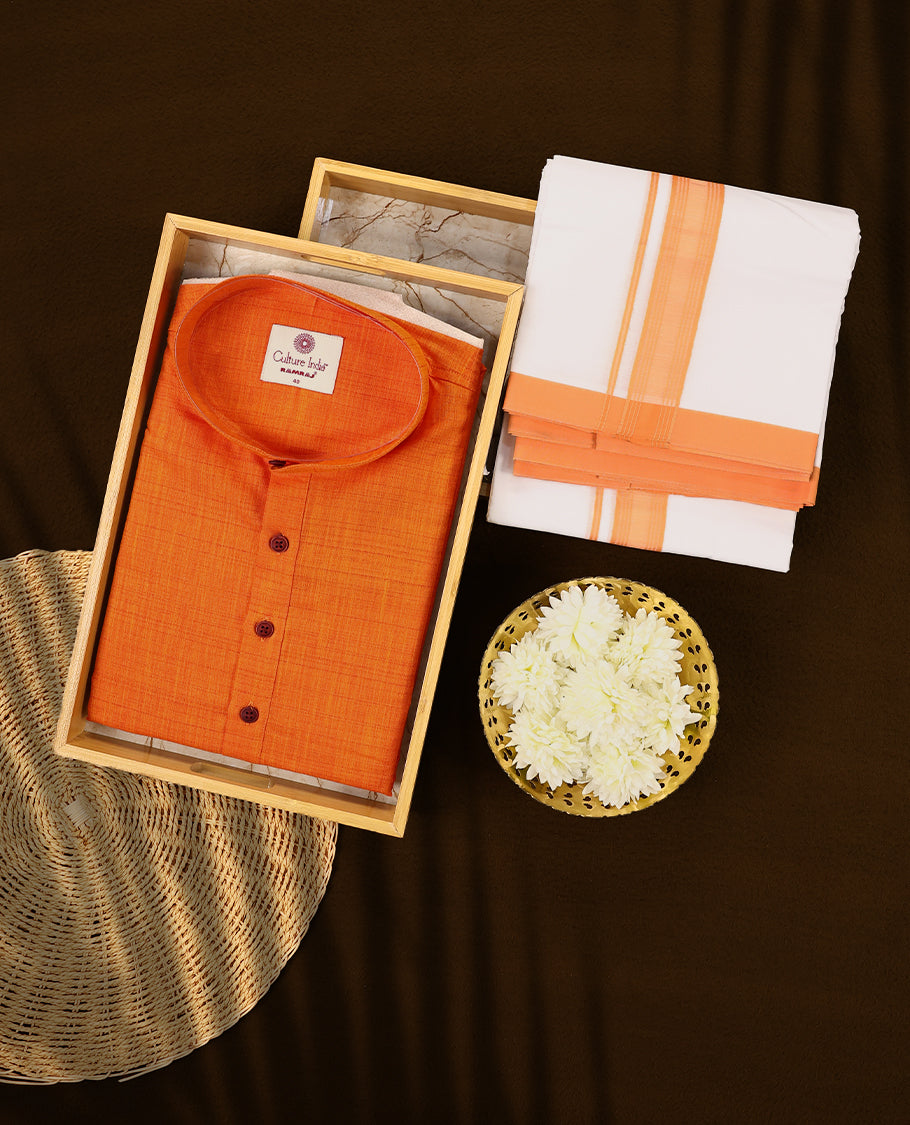 Bright orange short kurta and white dhoti set featuring a coordinated orange zari border crafted for a cheerful and traditional appearance perfect for festive occasions