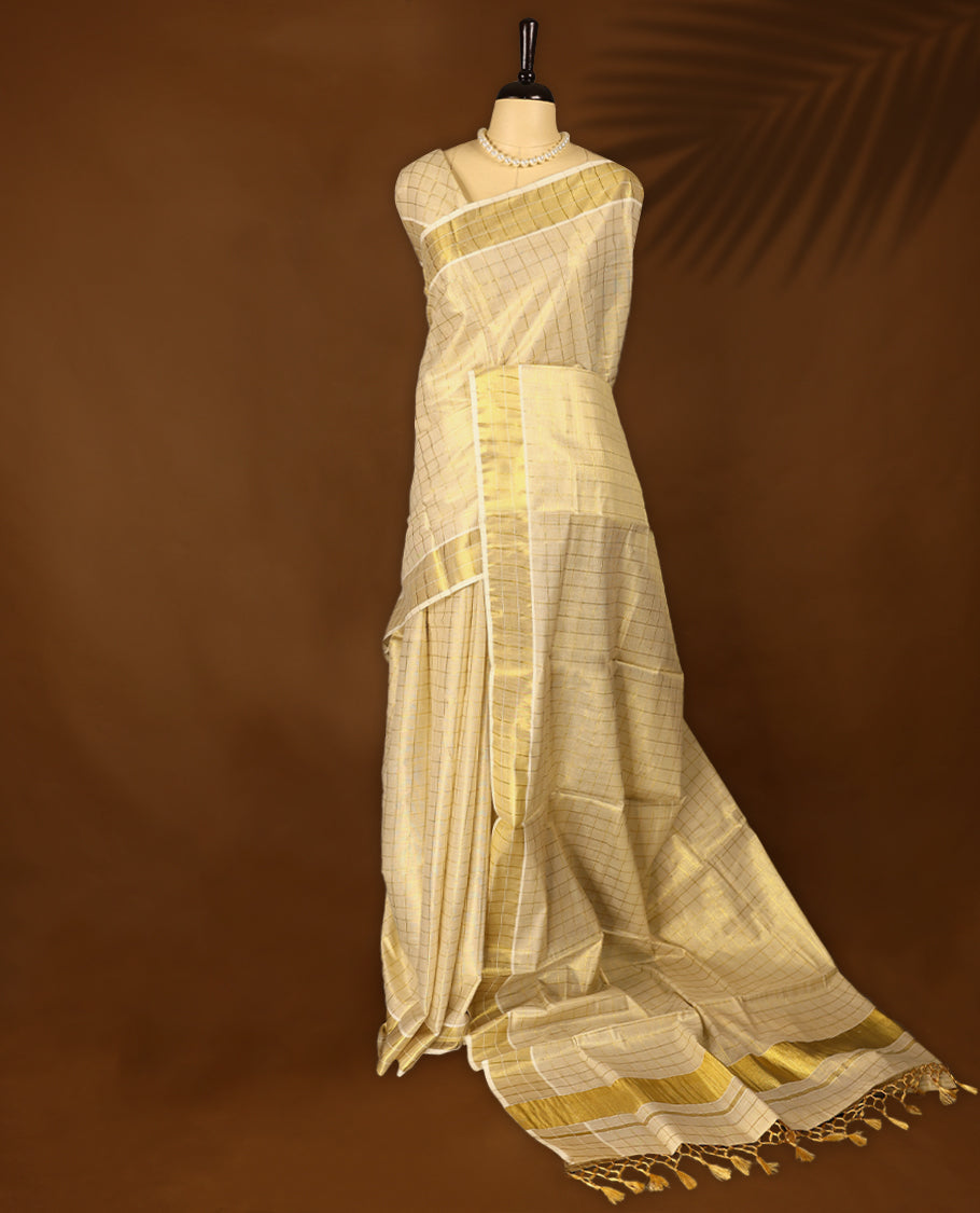 Kerala Tissue saree with fine golden Checks and Golden border with Matching Blouse