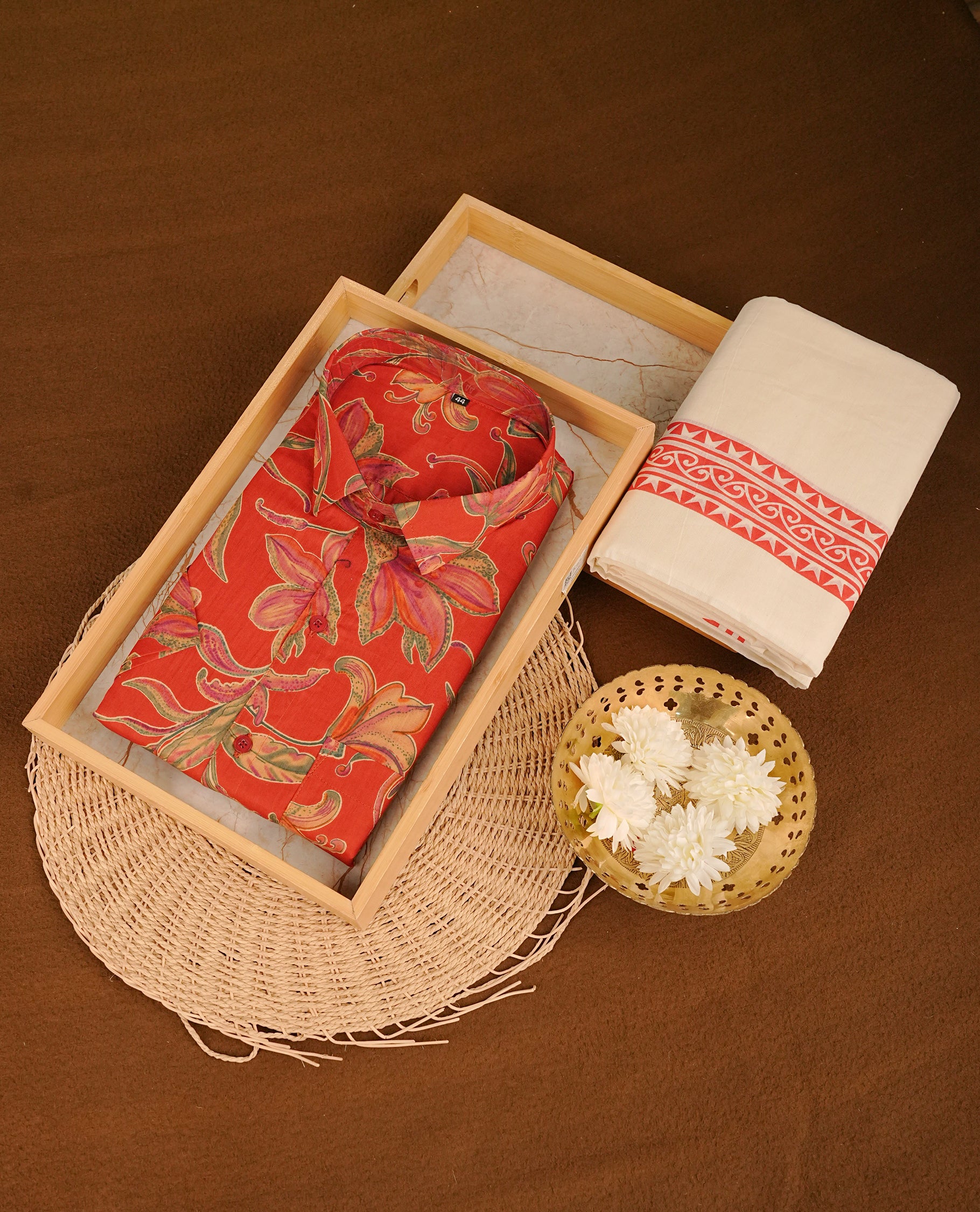 Maroon colour shirt featuring Floral Pattern printed body, paired with cream colour double dhoti featuring Red colour printed border.