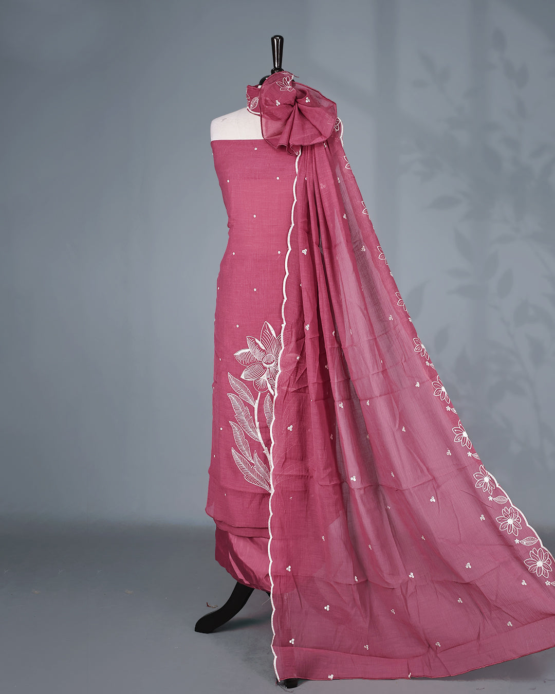 Rose mauve Colour Mul Chanderi Salwar Material Featuring Elegant White Floral Thread Embroidery on the Kurta, paired with a matching bottom & graceful embroidered Dupatta.