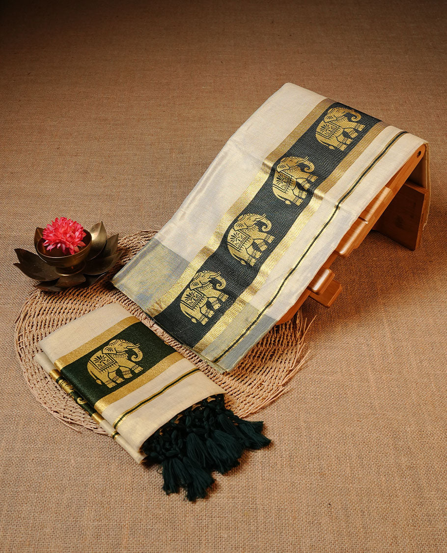Cream colour Tissue silk set mund Featuring Elegant plain body, Complemented by Elephant print on zari with green border.