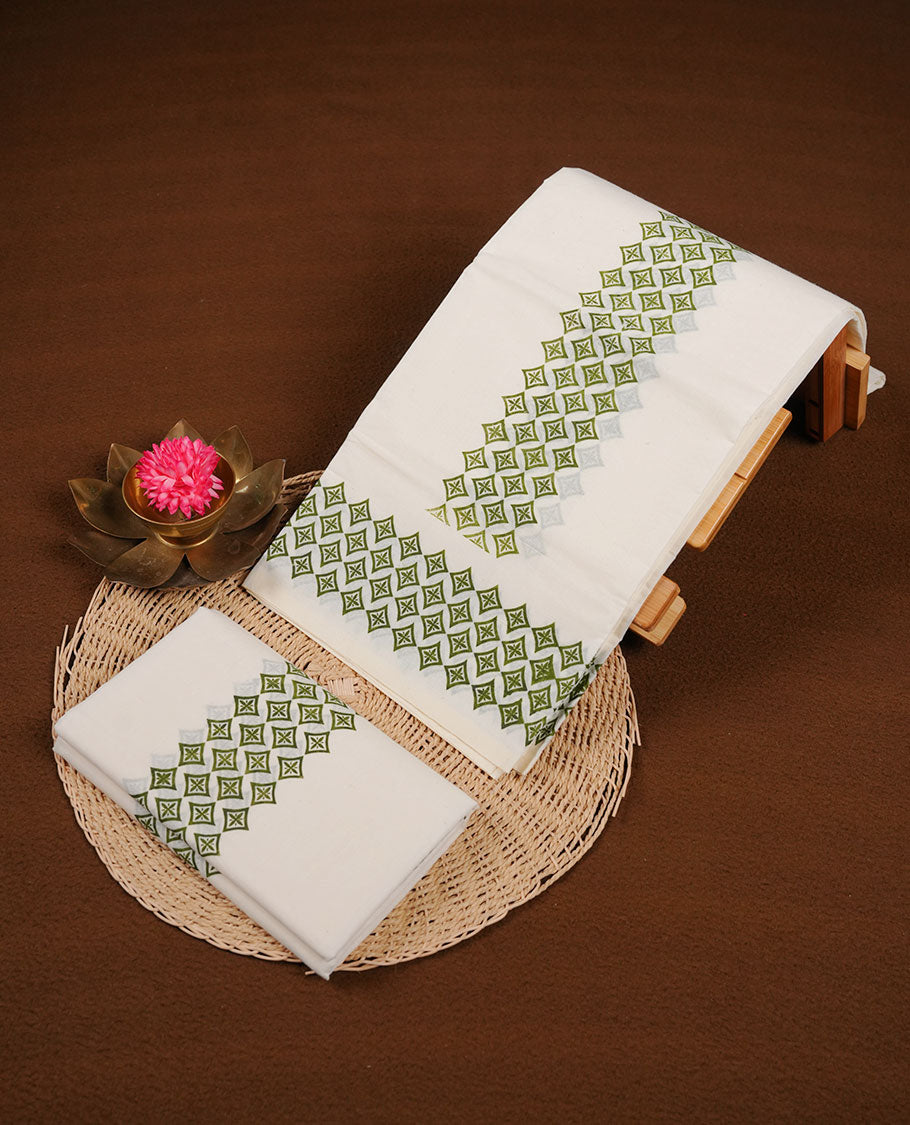 Off white colour cotton set mundu highlights green colour block print pattern across border (2.00/2.80 MTS)
