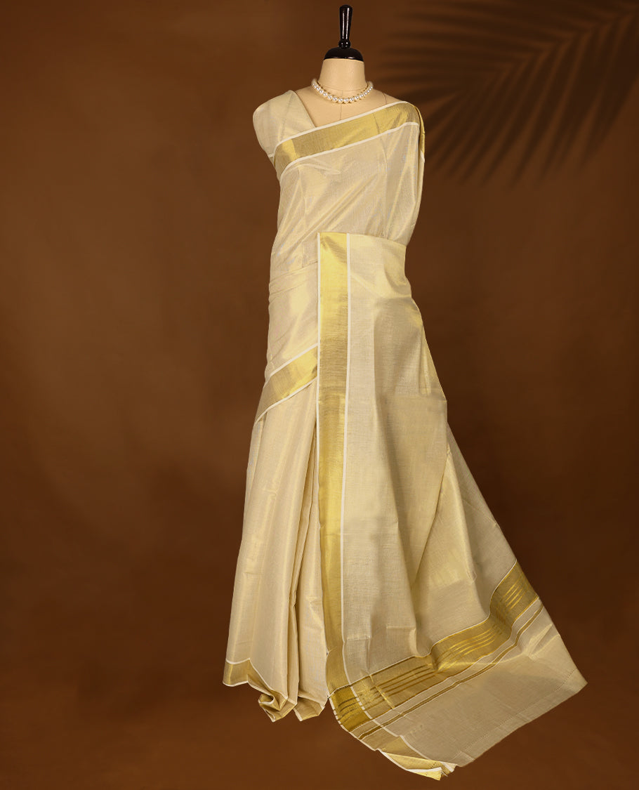 Kerala Tissue saree with Plain Body and Classic Golden border with Matching Blouse