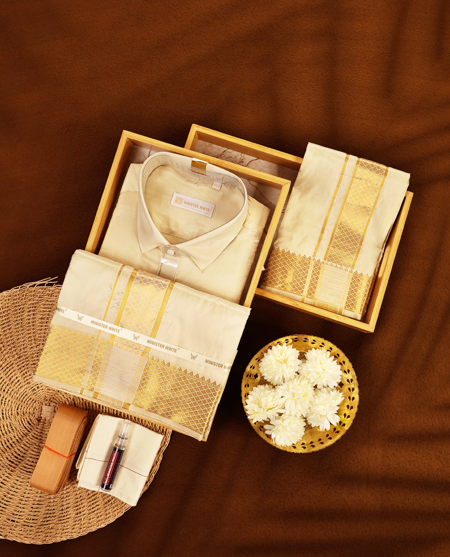 Fawn gold coloured silk wedding shirt, dhoti, and towel set from MINISTER WHITE, adorned with an elegant gold zari border, making it an ideal choice for weddings, festive occasions, and traditional celebrations.