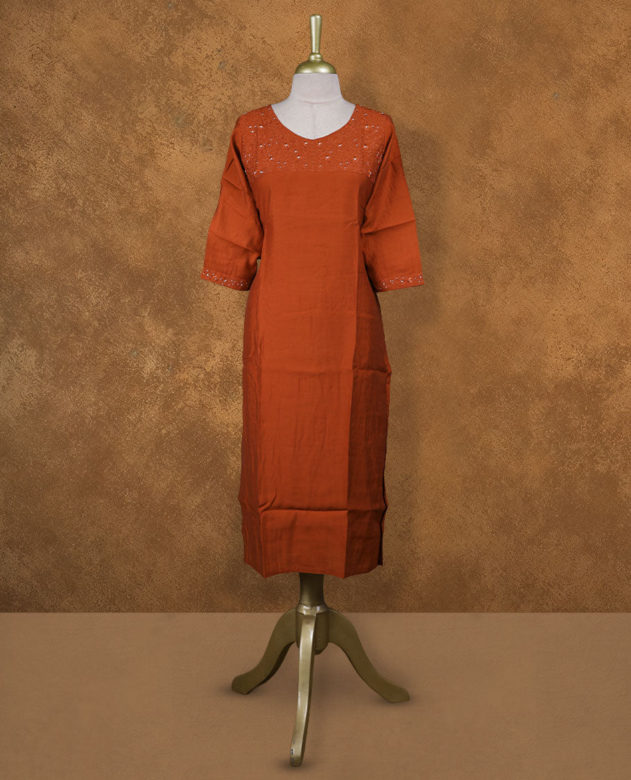 Brick red colour kurti with, knee length design, styled with a Self colour thread pattern on round neckline and a sleeve .