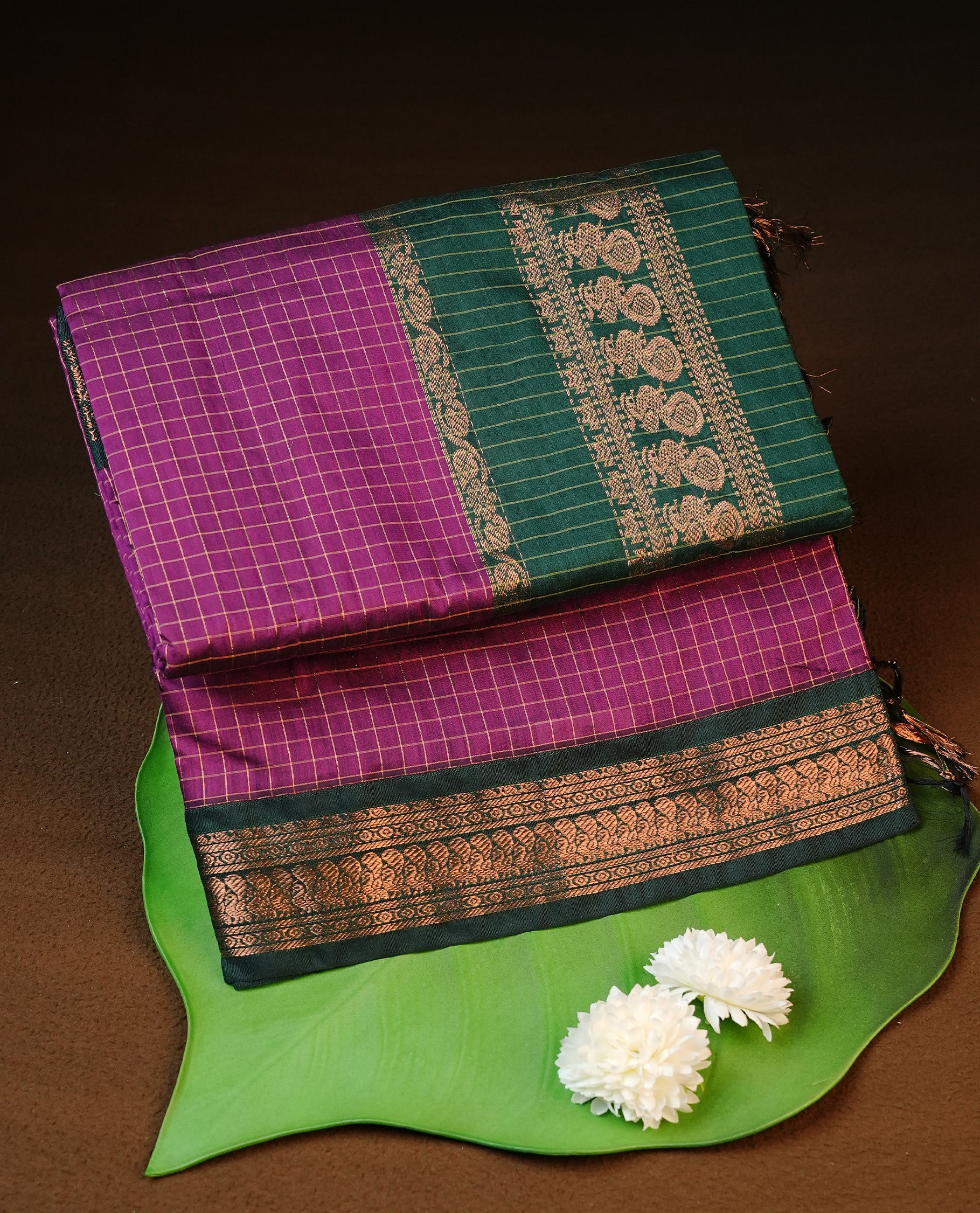 Grape colour kalyani cotton saree featuring gold zari check pattern on body, complemented by Green colour with Antique zari border, paired with matching blouse piece.
