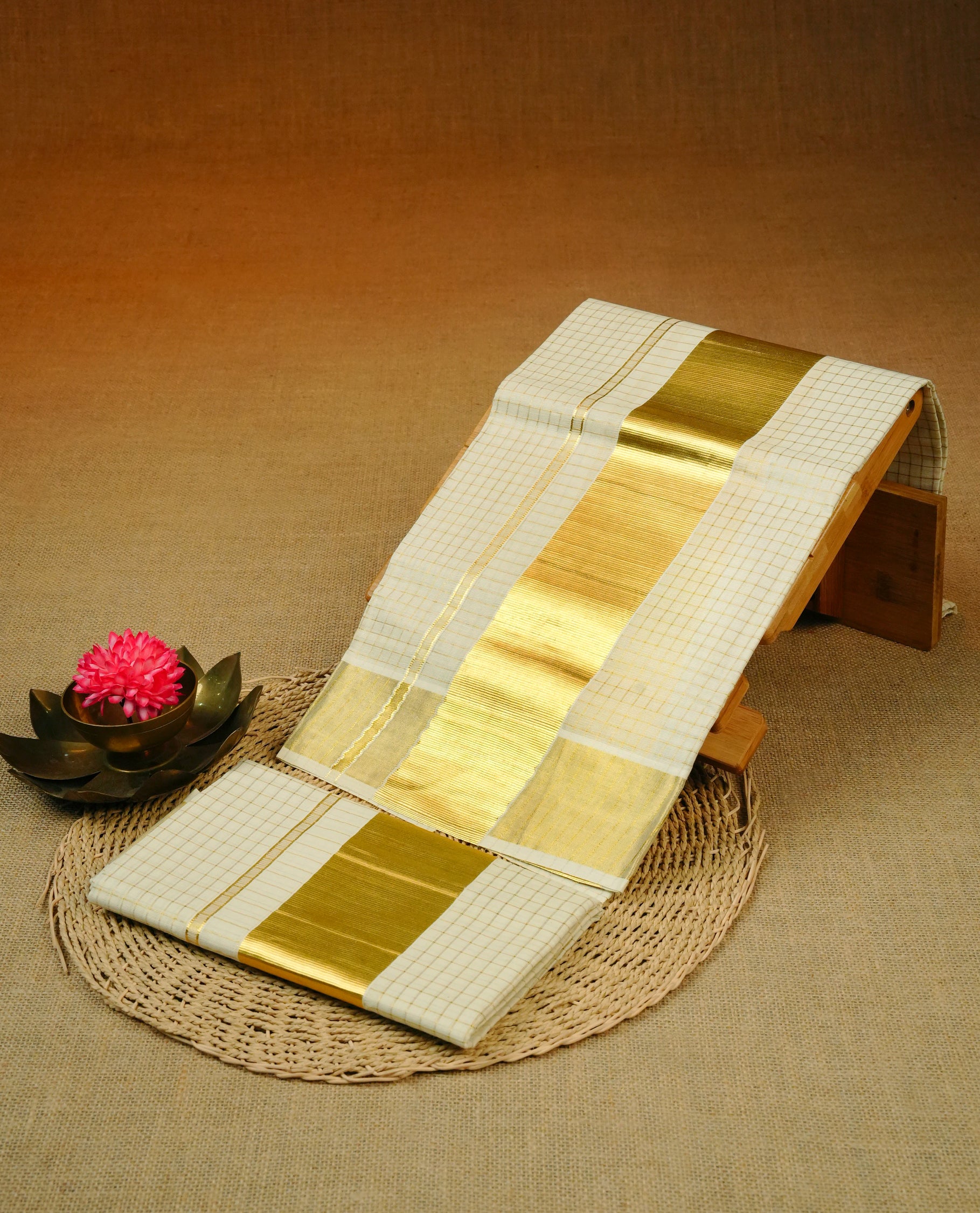 Cream colour cotton Set Mundu With gold zari check body, enhanced with Gold kasavu kara.