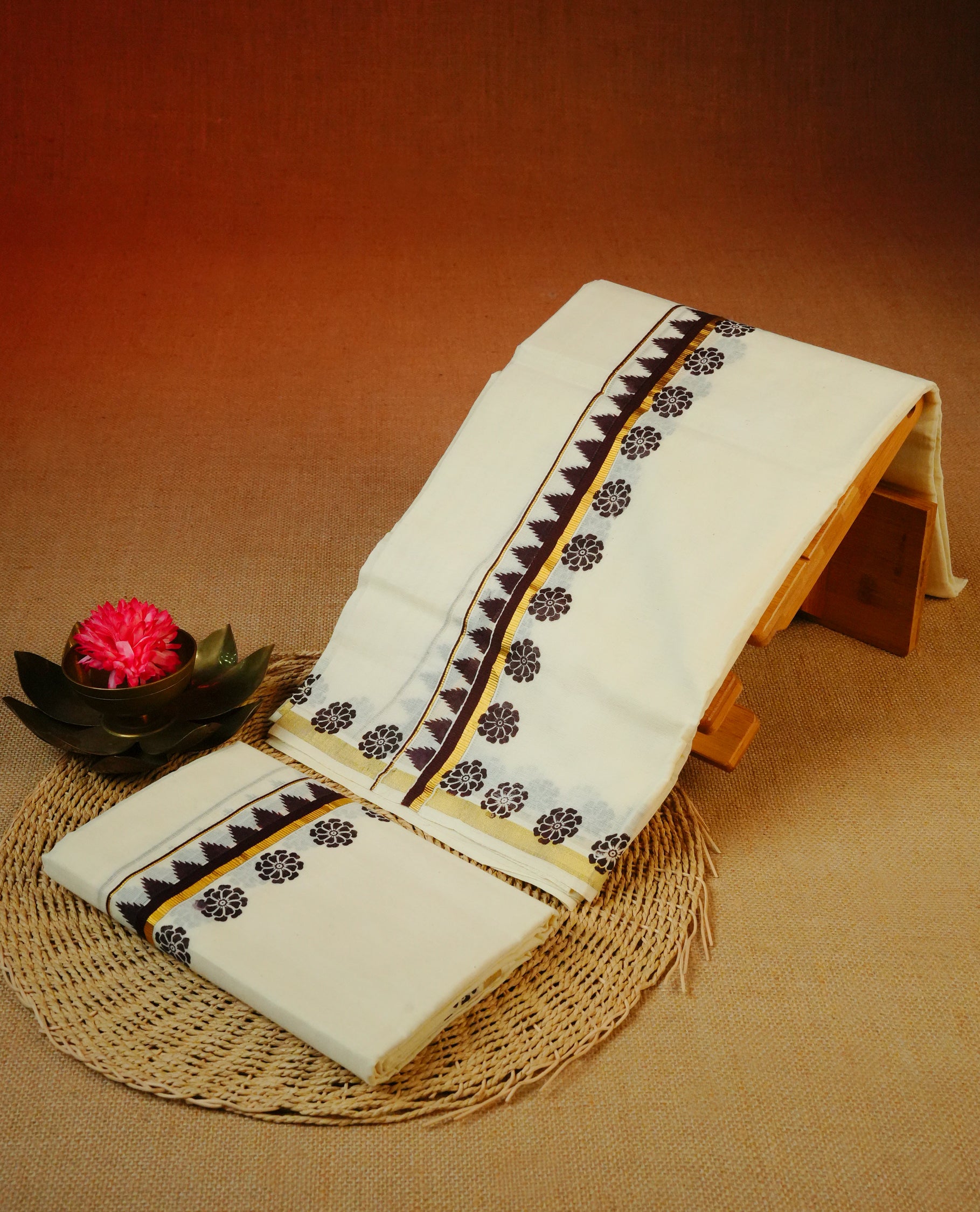 Cream colour Cotton set mundu With plain body, enhance gold zari with Dark chocolate temple & floral print kara.