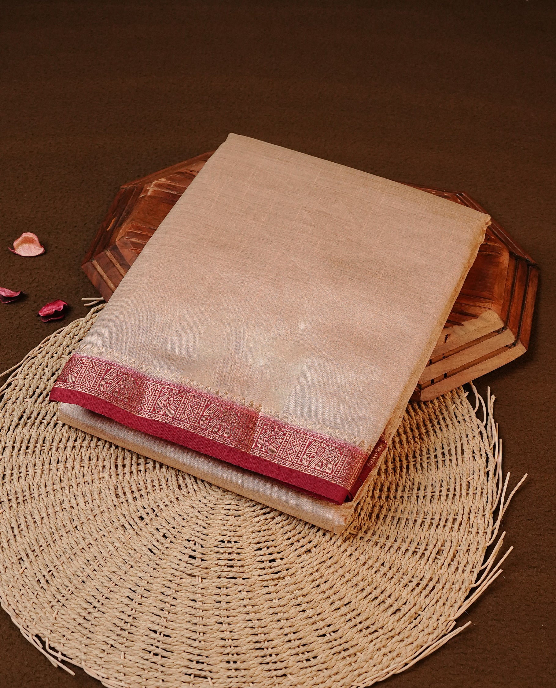 Cream colour Tussar silk saree Featuring Elegant Plain body, complemented by Contrast Maroon colour with gold zari border, paired with matching blouse piece.