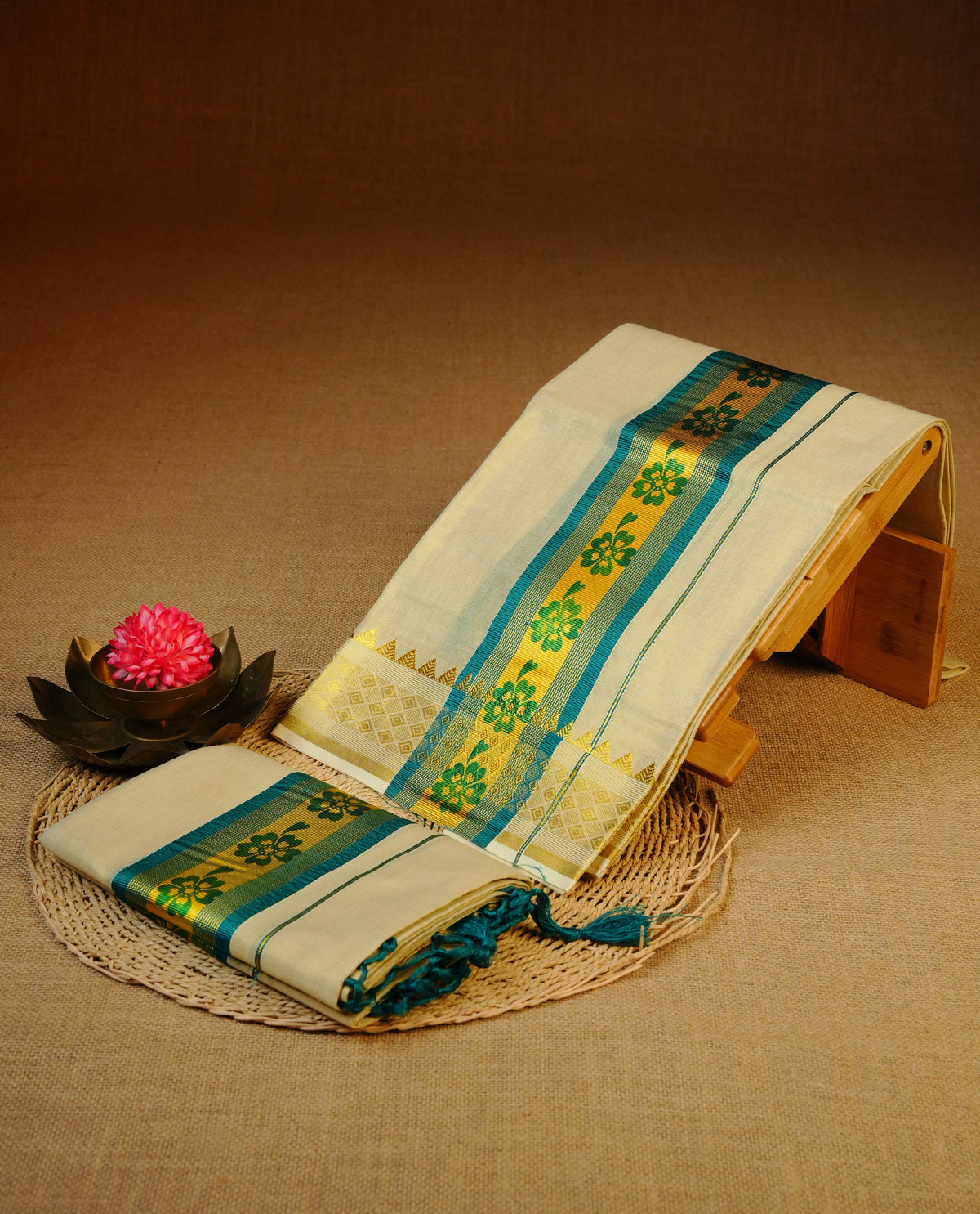 Light gold tissue set mundu featuring Teal colour print on kasav kara.