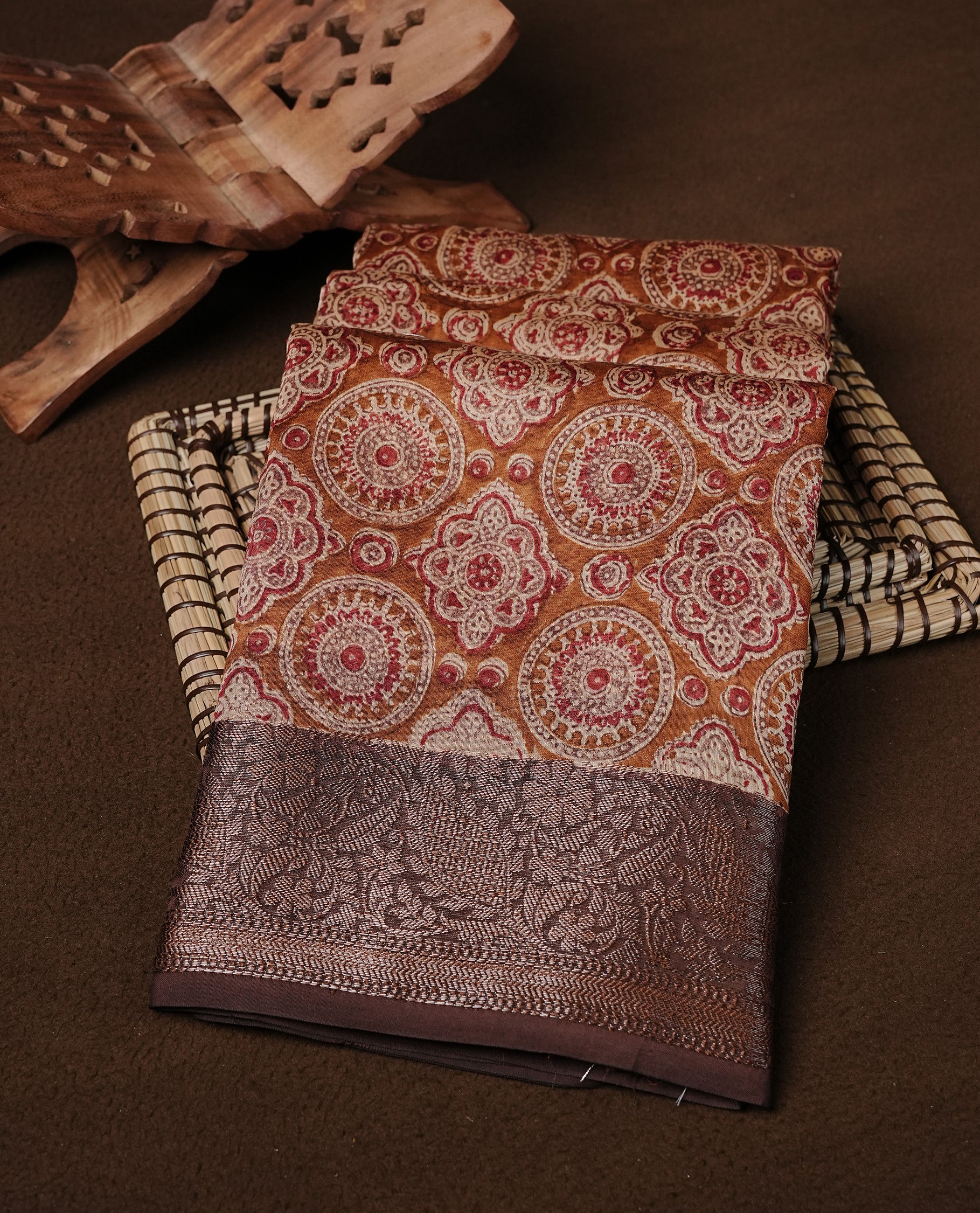 Brown colour Chanderi silk saree featuring Print on body, complemented by Brown colour with Antique zari border, paired with matching blouse piece.