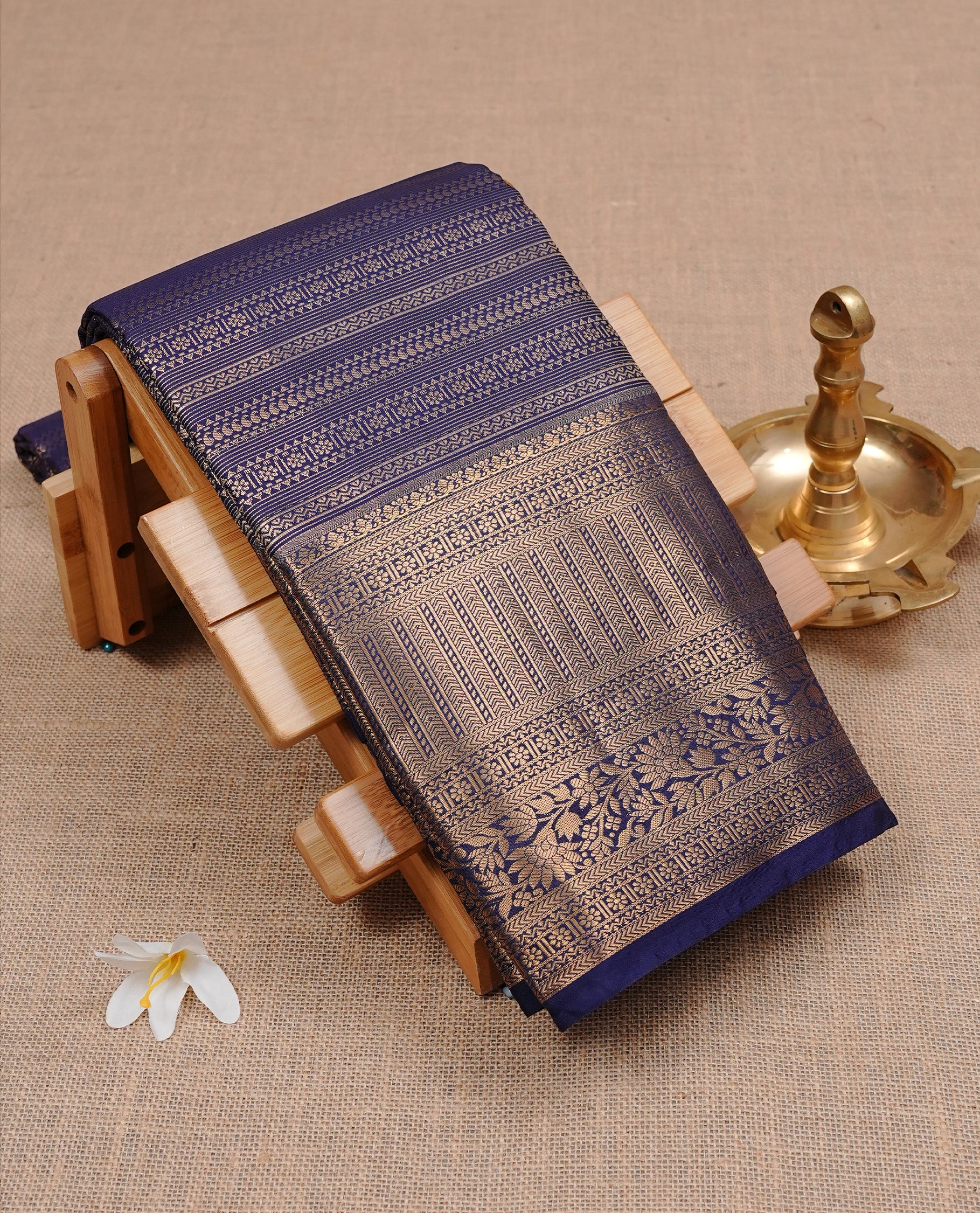 Navy Blue Semi Wedding Silk Saree featuring Gold Zari stripes with Motifs On body, Complemented with traditional zari with Self colour border, paired with matching blouse piece.