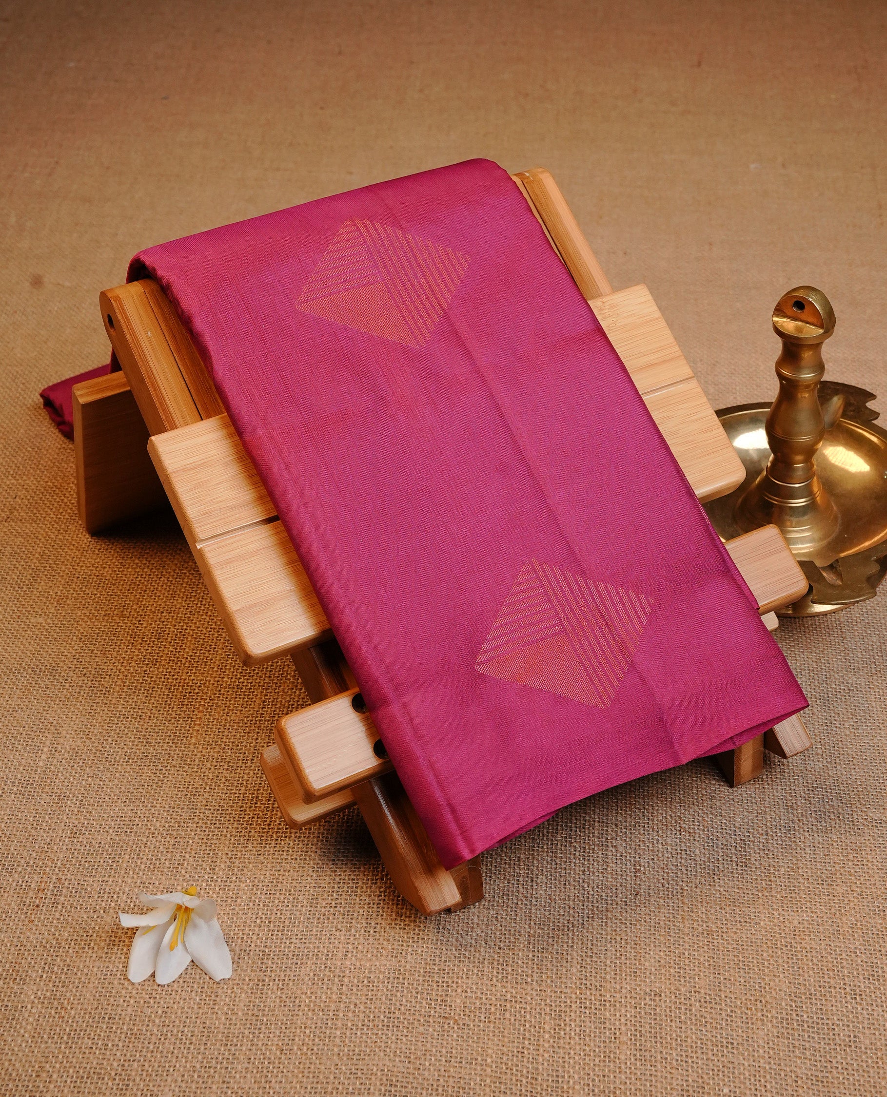 Dark Pink Colour Traditional Kancheepuram Silk Saree Featuring Copper Zari Diamond Motifs on the Body, Designed Without a Border and with a Grand Pallu, Paired with a Matching Blouse.