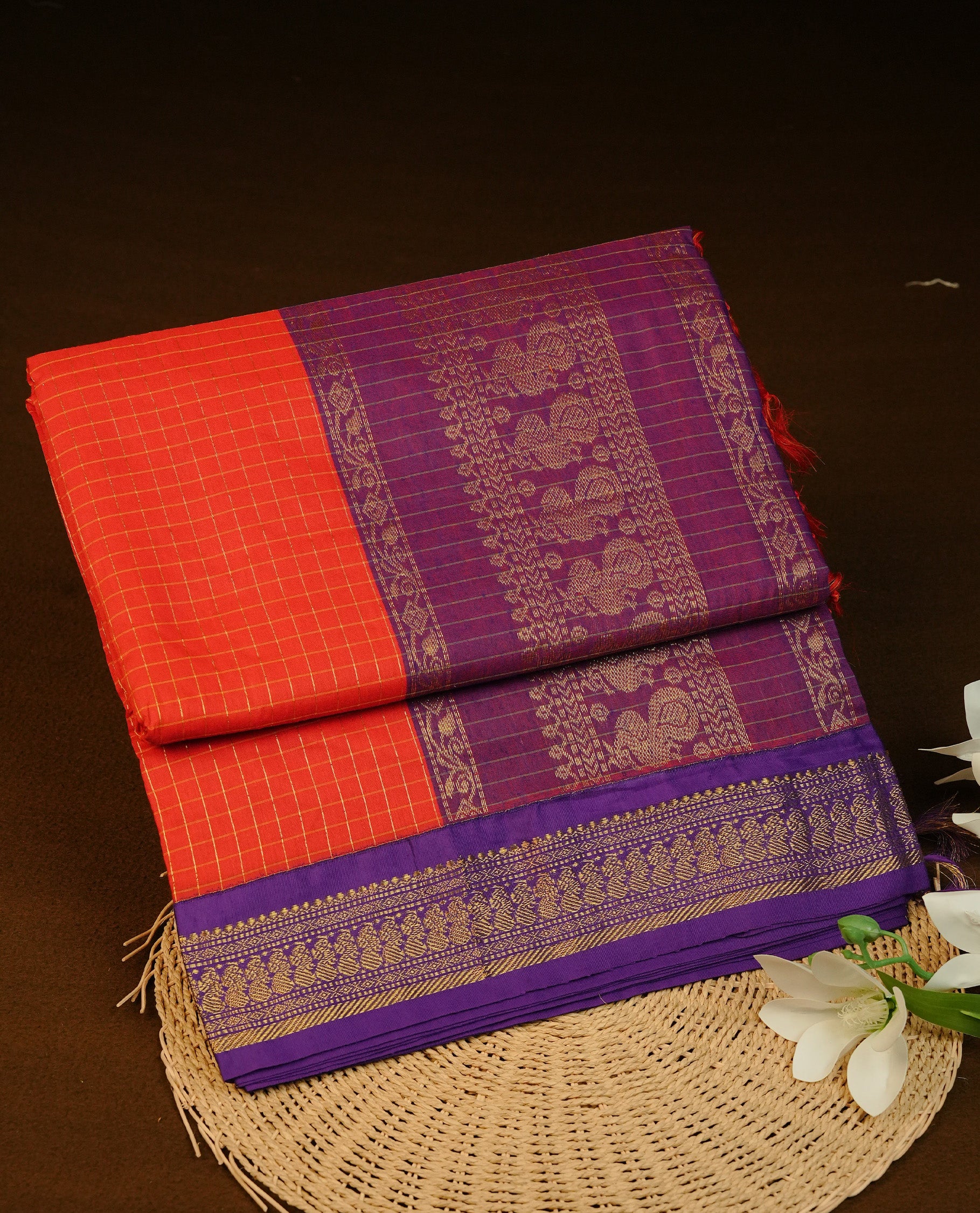 Red colour Kalyani cotton saree featuring Gold zari check pattern on body, complemented by Contrast Purple colour with grand gold zari border & pallu, matching blouse piece