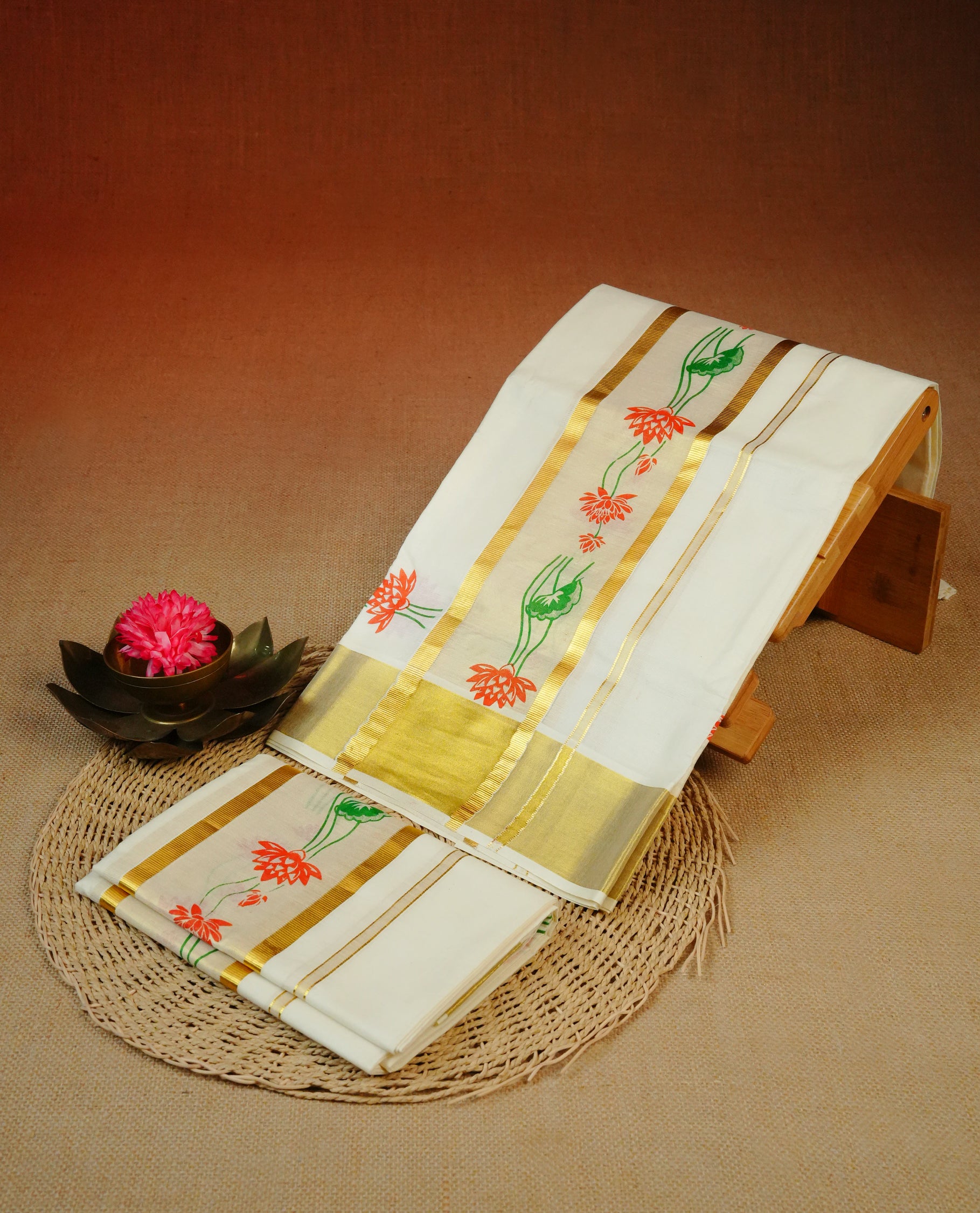 Cream colour cotton Set Mundu With Plain body, enhanced with Lotus Flower Print & Gold kasavu kara.